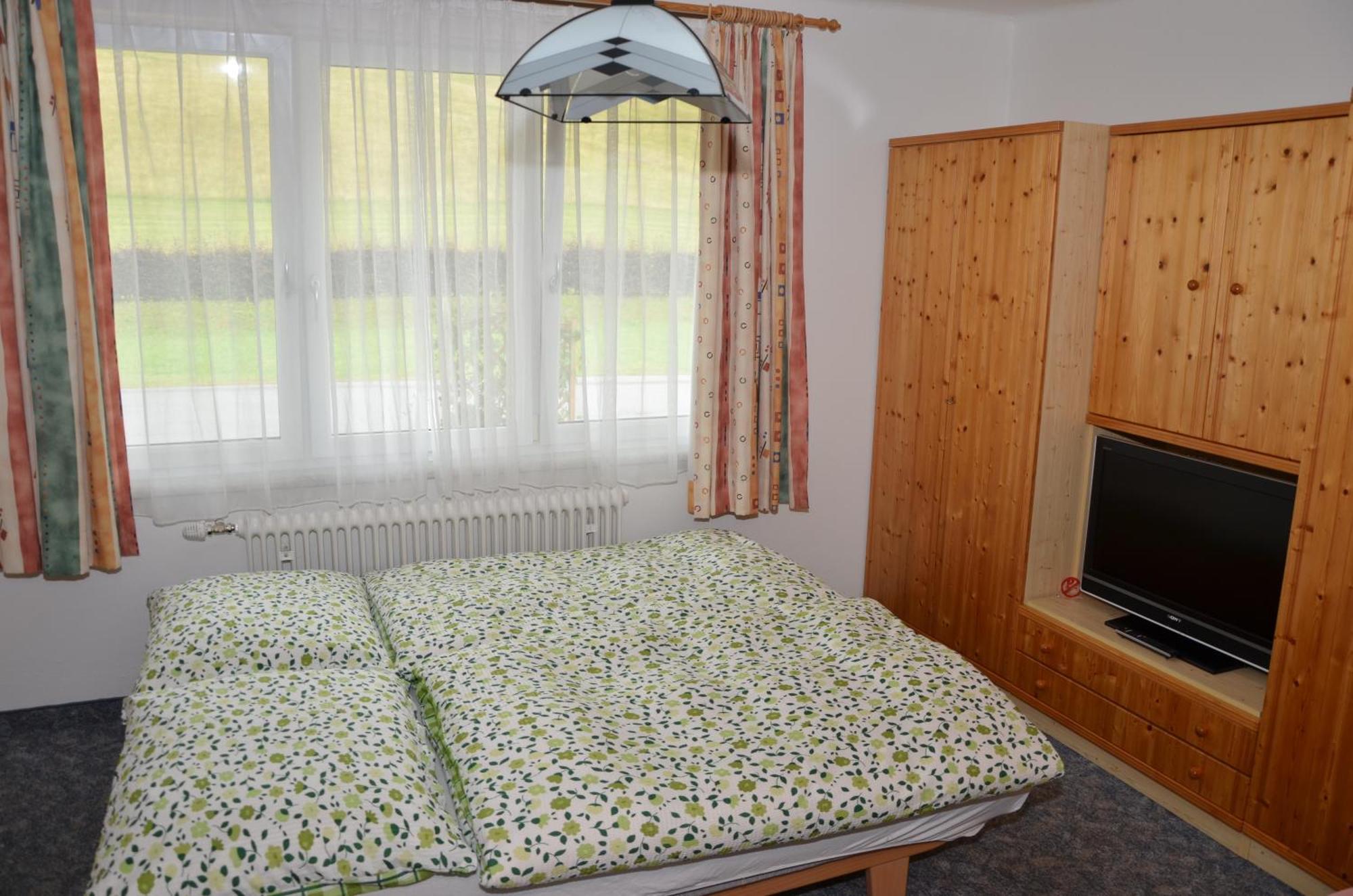 Haus Dachstein Schnitzer Hotel อีเบิน อิม พอนเกา ห้อง รูปภาพ